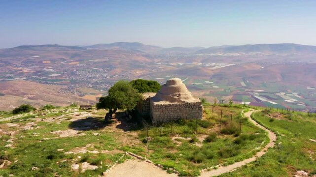 Mount Kabir in Samaria and the tomb of the sheikh or maqam Nebi Belan Ibn Ruba. 4k drone video