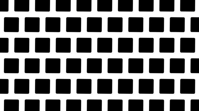 black and white rounded squares in fade and roll grid pattern