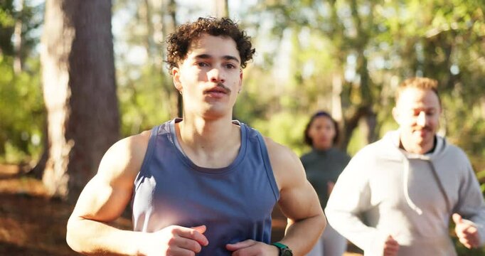 Man, smart watch and trail running in forest with group, challenge and stats for training in summer. Person, stopwatch and friends with timer, workout and exercise on path in woods for wellness