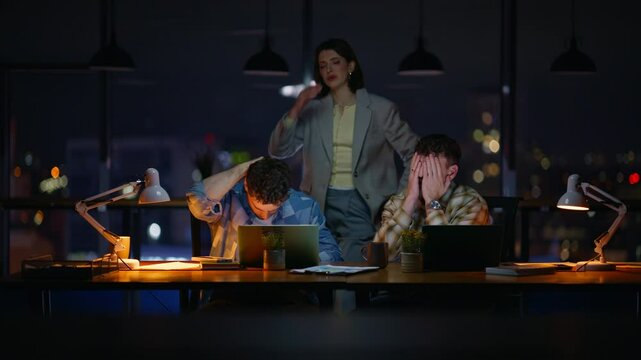 Night managers reacting business fail office laptop closeup. Nervous colleagues