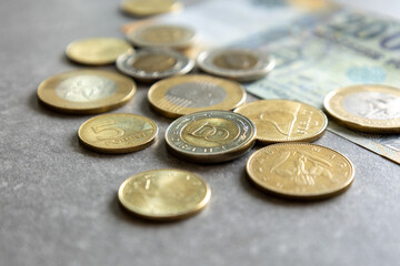 close-up side view of hungarian forint coins and banknotes