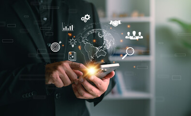 Businessman using smartphone with global internet connection, digital marketing icons, and data visualization. Great for finance, banking, mobile tech, big data, and smart business concepts.
