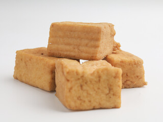 Tofu on a plate, on white background