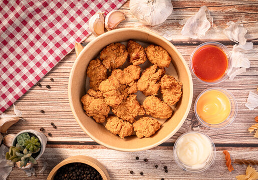 The Frence fire and nuggets  in paper bowl for food concept.