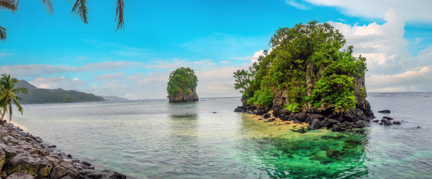 The iconic offshore rock formations known as Fatumafuti (also Fatu ma Futi or Tower Rocks) in American Samoa. Associated with a Samoan love story legend. Tutuila Island, American Samoa