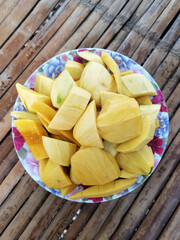 fresh mango on a wooden table