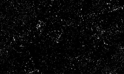 Old monochrome grunge background with dots, scratches and splats of paint. Abstract background. Monochrome texture. Abstract grunge grey dark stucco wall background