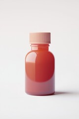 A translucent, reddish-orange pill bottle with a light pink cap sits on a white background