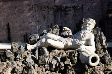 Stone sculptures of the drunken god Dionysus