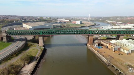 Sunderland UK: 12th April 2025: Queen Alexandra Bridge over the River Wear with stunning 20th century architecture static drone footage