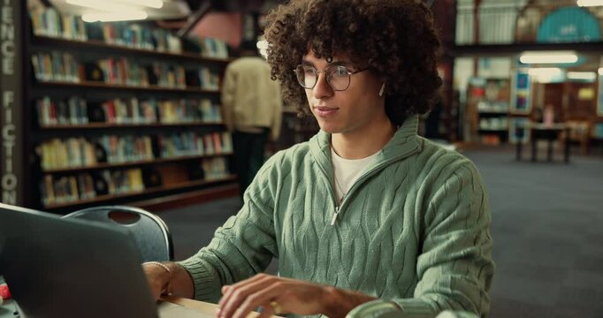 Man, library and student with laptop, listening to music and education with deadline for project. Computer, scholarship or happy person with pc, university and sound with radio, internet or knowledge