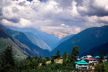 Himalayan mountain landscape.  Pundarik  Upper Neahi village. Sainj Valley, Eco Zone, Great Himalayan National Park, Himachal, India.