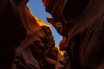 The Navajo Sandstone is a geological formation in the Glen Canyon Group.A slot canyon is a long,...