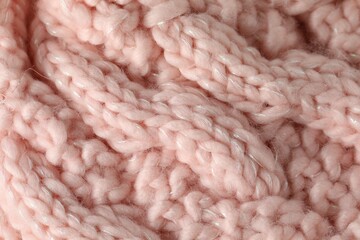 Texture of pink wool fabric as background, top view