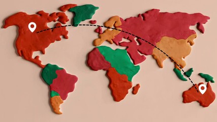 Playful Plasticine Model World Map with Pins between America and Australia, Red and Green, Geographical Representation words + concept