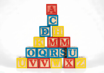 Colorful Alphabet Blocks Stacked in a Pyramid