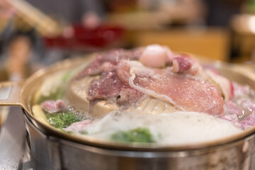 Thai barbecue buffet with sliced beef are grilled in the BBQ grill pan. Thai style cuisine called Moo Ka Ta.