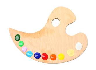 Wooden palette with paints isolated on white, top view