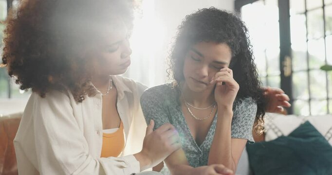 Woman, comfort and sad friend on couch for support, breakup and sympathy for depression. People, emotional and consoling person for relationship fail, broken heart and grief with breakdown at house