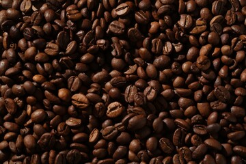 Aromatic coffee beans as background, top view
