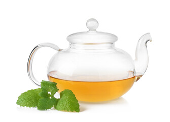 Aromatic lemon balm tea in glass teapot and fresh leaves isolated on white