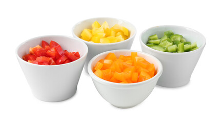 Pieces of fresh colorful bell peppers in bowls isolated on white