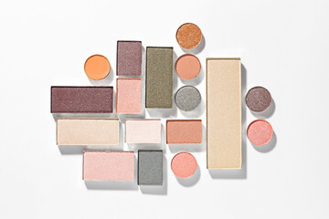 Beautiful eyeshadow refill pans on white background, flat lay