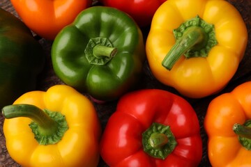 Fresh colorful bell peppers on table, flat lay