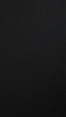 Fototapeta premium Black rough paper texture, close view paper pattern background