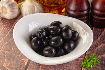 Mediterranean marinated Black olives in the bowl