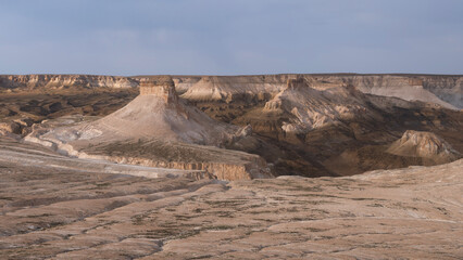Desert Buttes in Bozhira Valley towering over the desert steppe of Mangystau, Western Kazakhstan during Sunset