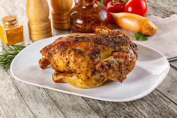 Baked in oven whole chicken with spices