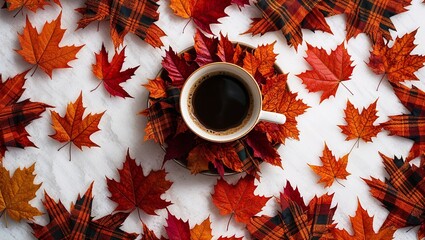 A warm cup of coffee placed on colorful autumn leaves.