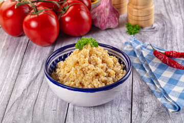 Vegan cuisine - boiled bulgur garnish