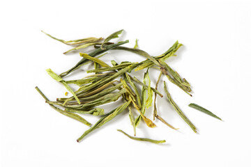 Fototapeta premium Dried green tea leaves isolated on white background.