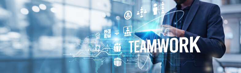 Businessman using tablet analyzing teamwork and cross-functional collaboration growth driving digital transformation, and enhancing productivity across departments for sustained business success.