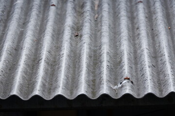 Detailed photo of asbestos roof of a house