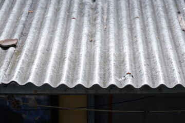 Detailed photo of asbestos roof of a house