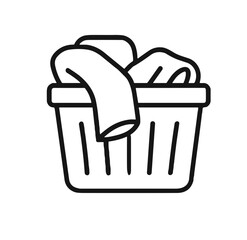 Laundry basket filled with clothes for washing, concept of children's day  