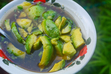 Processed avocado with added liquid sugar