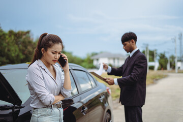 Asian woman talking on the phone asking for help in claiming insurance in case of an accident