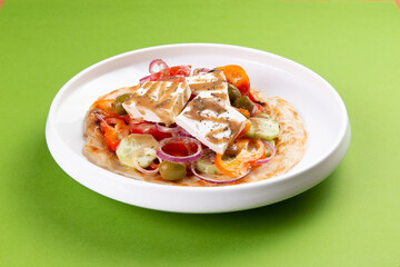 Salad with onions and feta cheese.