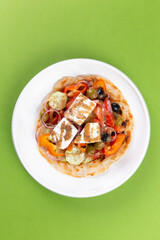 Salad with onions and feta cheese.