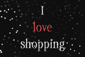 a black and white photo with a red and white text that says I love shopping