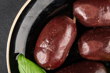 Black pudding sausage fresh delicious gourmet food background on the table rustic food top view...