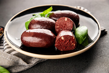 Black pudding sausage fresh delicious gourmet food background on the table rustic food top view...