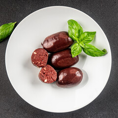 Black pudding sausage fresh delicious gourmet food background on the table rustic food top view...