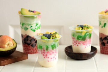 Various Size Cup of Es Teller Sultan in Plastic Cup, Indonesian Traditional Mix Fruit Popular Street Food