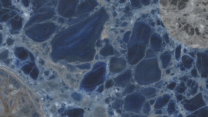 Full-frame 2D slab of Blue Marble of Sarrancolin with abstract blend of navy, grey, and white minerals.