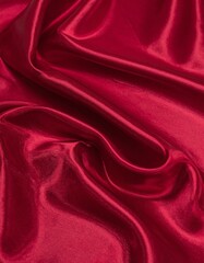 Obraz premium Dark red glossy silk cloth texture close view background